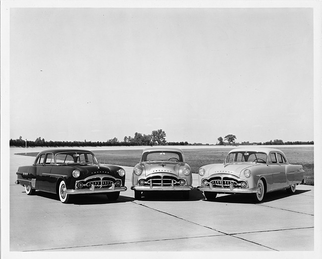 1951 Packards, front view, parked next to one another