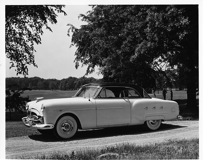 1952 Packard Mayfair sports coupe, nine-tenths left side view, parked on country road