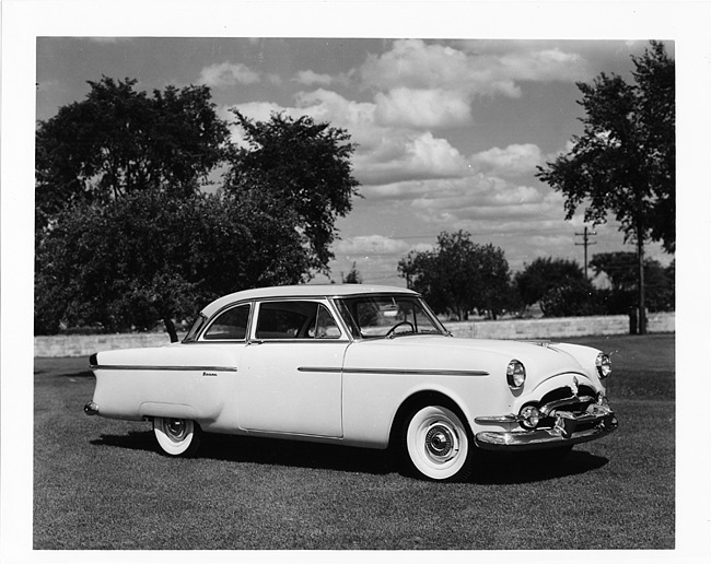1954 Packard sedan, seven-eights right side view, parked on grass