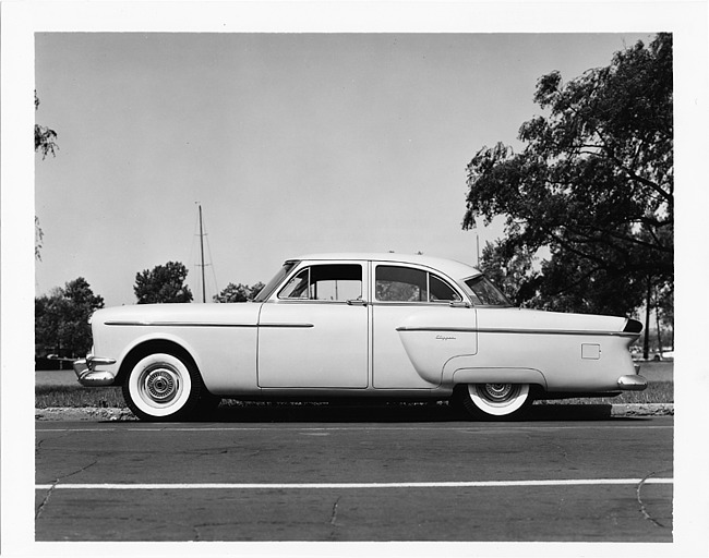 1954 Packard Clipper, left side view, parked on street