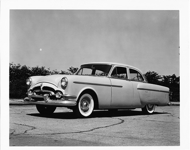 1954 Packard Clipper, three-quarter left side view, parked on street