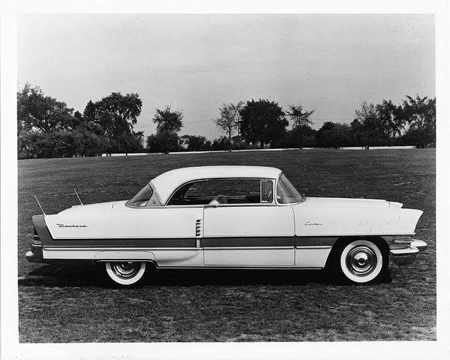 1956 Packard 2-door sedan, right side view, parked on grass