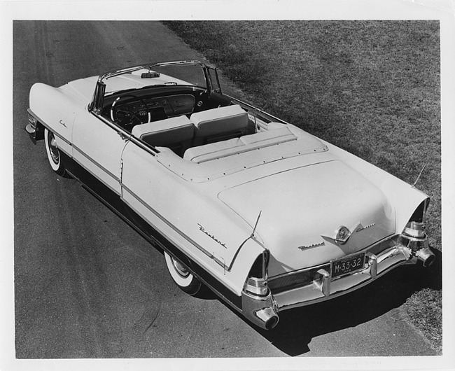 1956 Packard convertible, three-quarter rear right elevation view, top folded