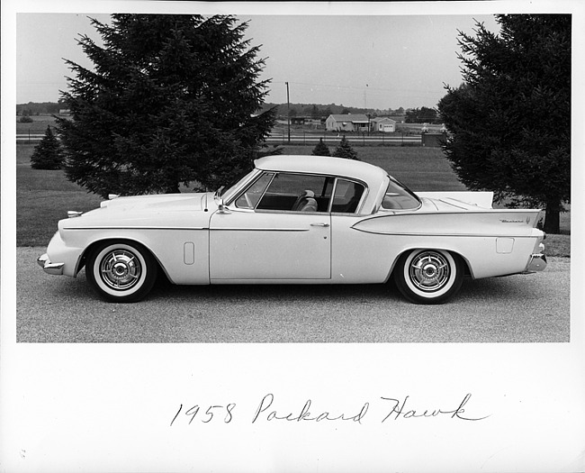 1958 Packard Hawk, left side view, parked on drive