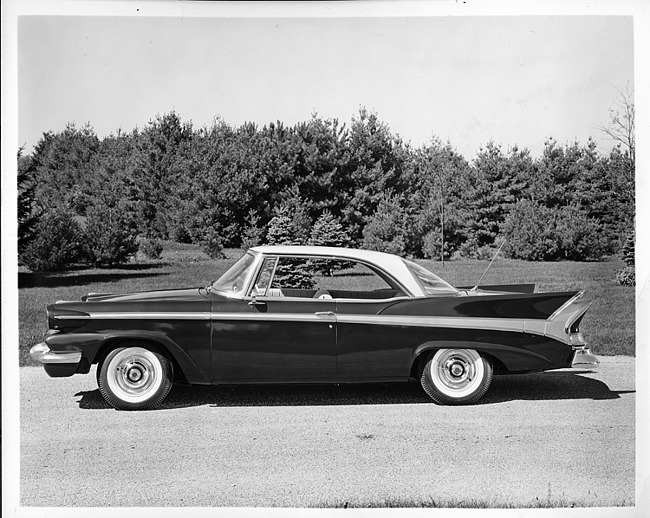 1958 Packard sedan, left side view, parked on drive