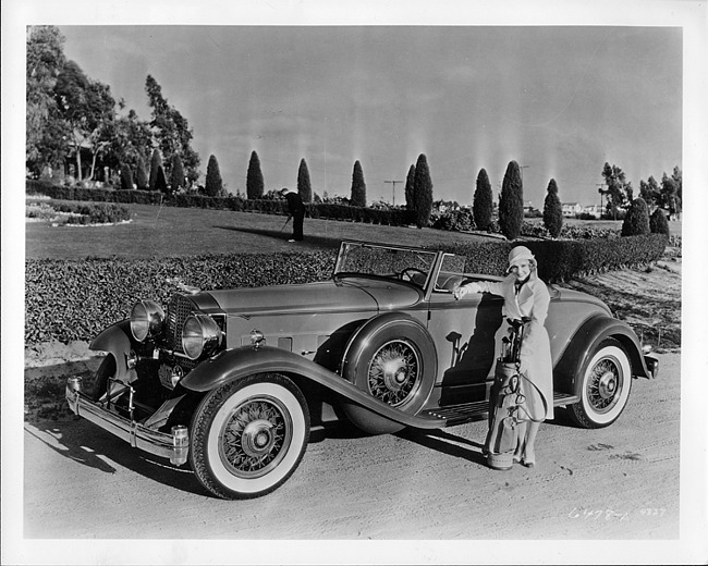1932 Packard coupe roadster and owner Madge Evans with golf clubs