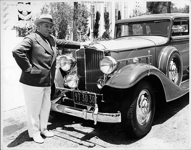 1933 Packard sedan and owner comic strip creator George McManus