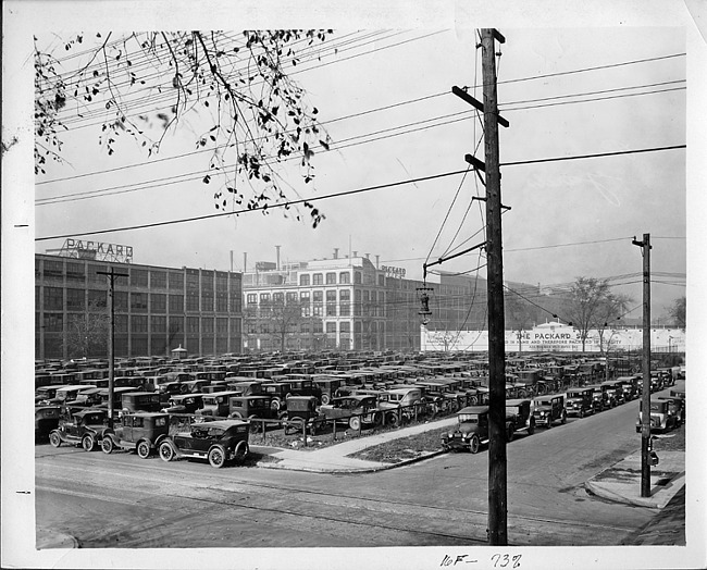 Packard factory parking yard full of models
