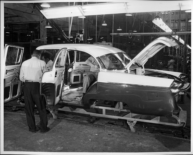 1955 Packard Clipper on assembly line, left side view