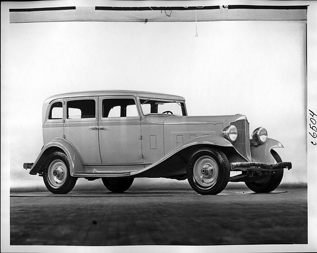 1932 Packard prototype sedan, three-quarter right front view, light in color
