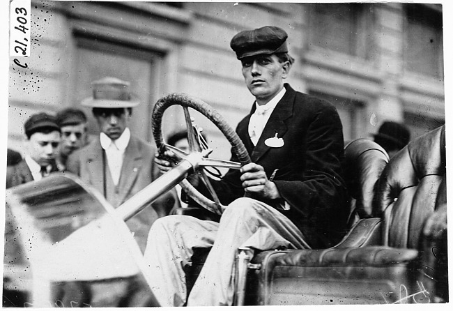 Participating driver in 1909 Glidden Tour automobile parade, Detroit, Mich.