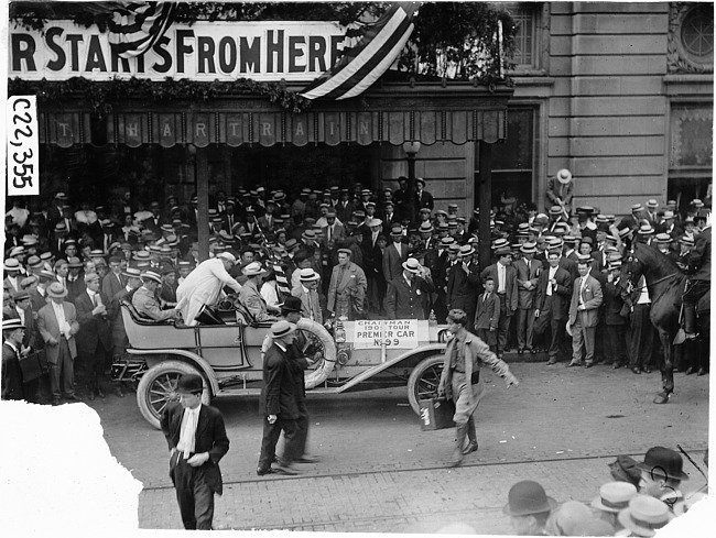 F.B. Hower in official's Premier car at start of 1909 Glidden Tour, at Detroit, Mich.
