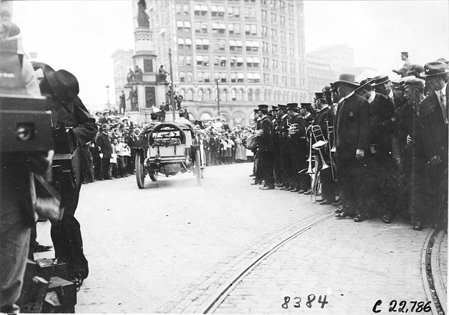 Car passing Campus Martius at start of the 1909 Glidden Tour, Detroit, Mich.