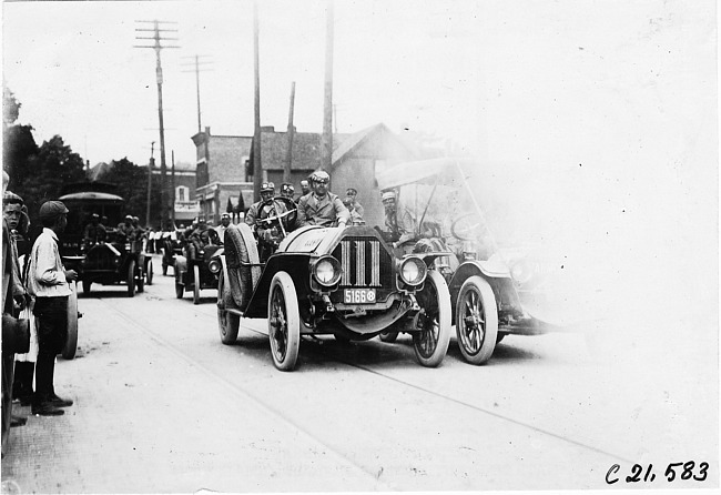 Cars passing through Jackson, Mich., in 1909 Glidden Tour