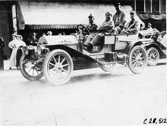 Jean Bemb in Chalmers-Detroit car arriving in Kalamazoo, Mich., 1909 Glidden Tour