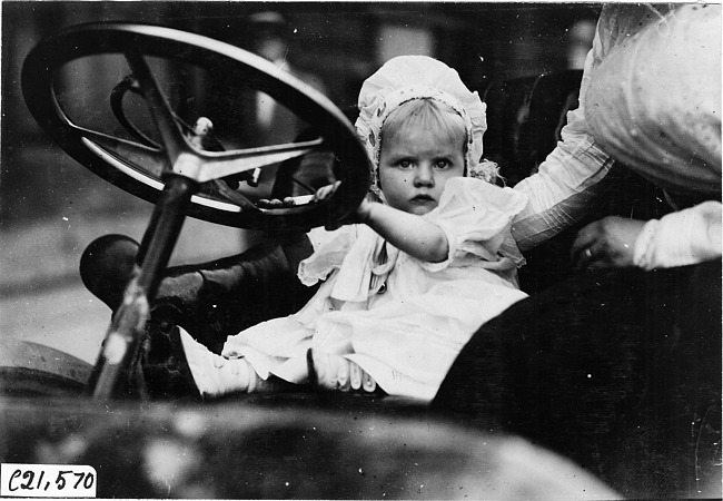 Young American at the wheel of Studebaker #81 in Chicago, Ill., at the1909 Glidden Tour
