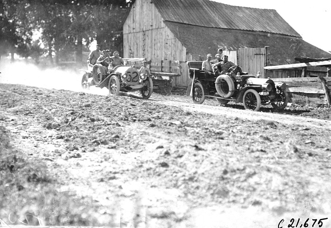 Bemb in Chalmers-Detroit car beside barn on road to Sauk City, Wis., 1909 Glidden Tour