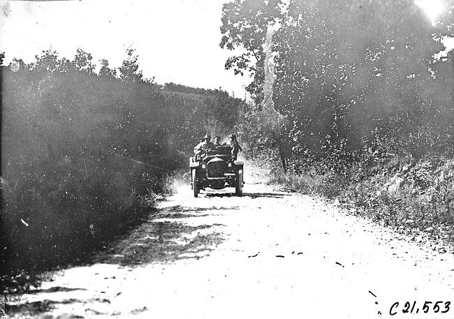 Studebaker car climbing a hill at Baraboo, Wis., 1909 Glidden Tour
