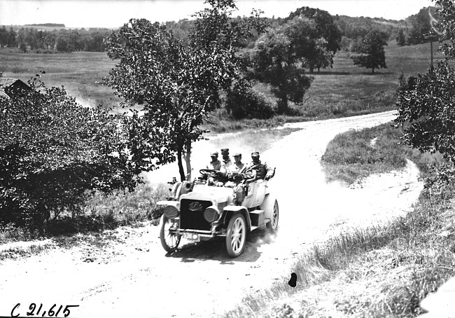 Dunson and Searles in White Steamer car on the road to Elroy, Wis., 1909 Glidden Tour