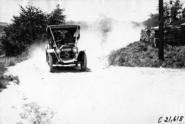Marmon in Marmon car on the road to Elroy, Wis., 1909 Glidden Tour