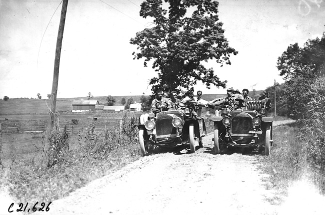 Studebaker cars on rural road at 1909 Glidden Tour