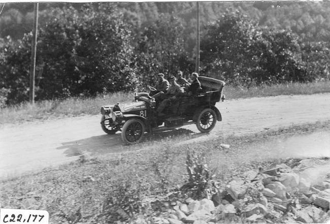 D. McIntosh in Studebaker press car on rural road at 1909 Glidden Tour