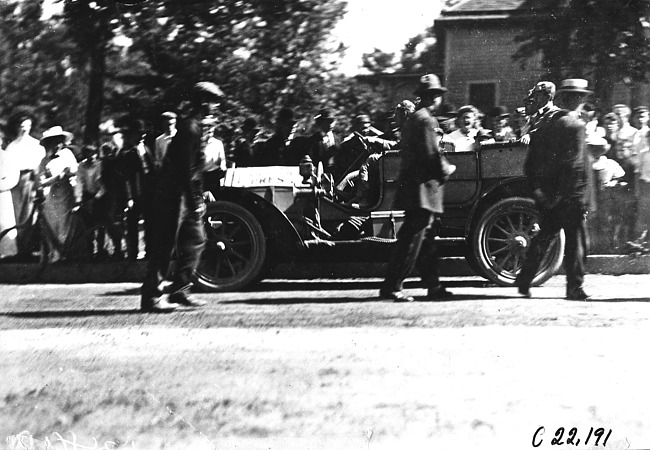 H. Bill in Chalmers car leaving Winona, Wis., 1909 Glidden Tour