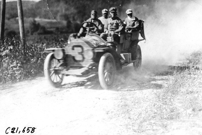 Chalmers-Detroit car going through Pleasant Valley, Minn., 1909 Glidden Tour