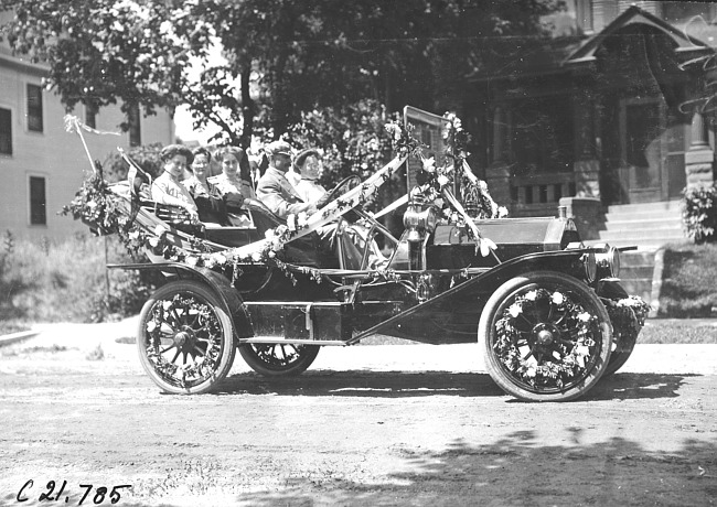 Decorated Chalmers car at the parade in Minnesota, at the 1909 Glidden Tour