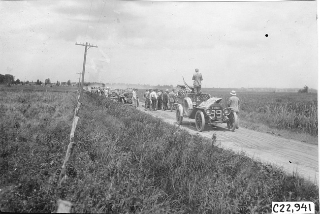 Premier car holding up participants in the 1909 Glidden Tour