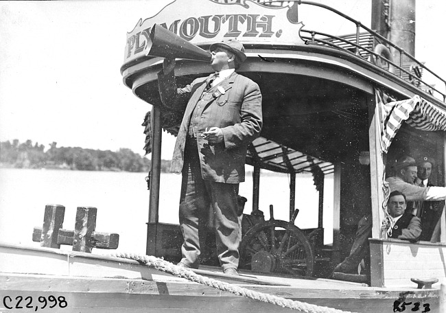 Smithson with megaphone on board 'Plymouth,' at 1909 Glidden Tour