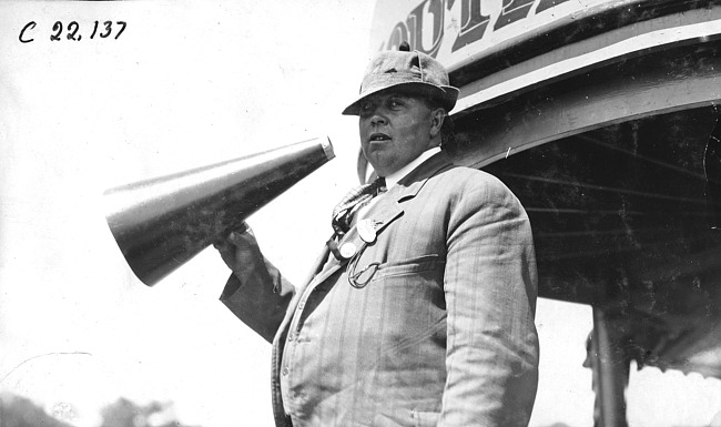 Smithson with megaphone on board 'Plymouth,' at 1909 Glidden Tour