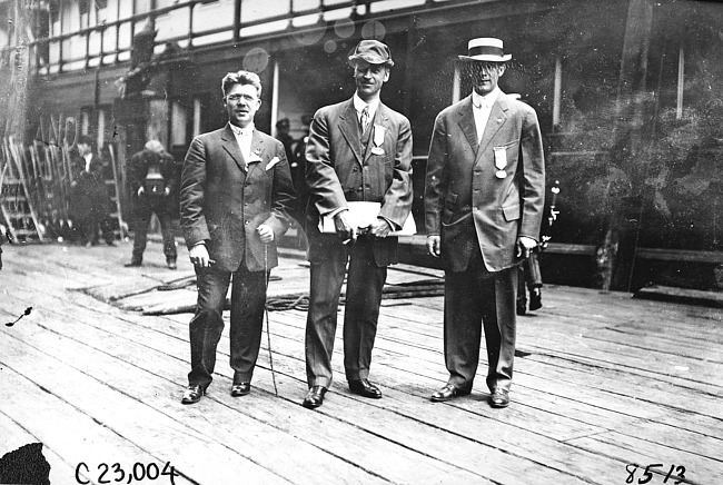 Glidden tourists on board unidentified boat, at 1909 Glidden Tour