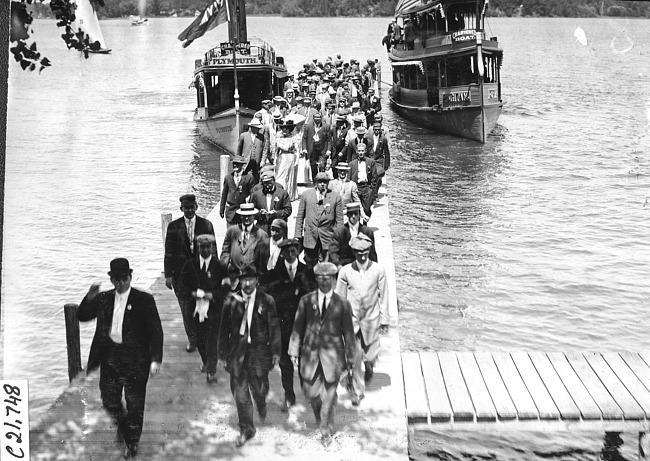 Glidden tourists disembark Plymouth and Puritan excursion boats, at 1909 Glidden Tour