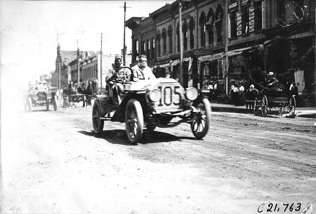 John Machesky in Chalmers car passing through Faribault, Minn., at 1909 Glidden Tour