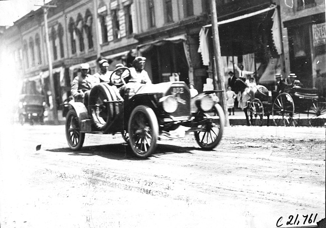 W.S. Gregory in Moline car passing through Faribault, Minn., at 1909 Glidden Tour
