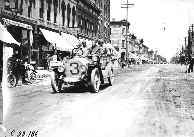 William Bolger in Chalmers car near Madison Lake, Minn., at 1909 Glidden Tour