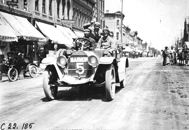 Marmon in Marmon car near Madison Lake, Minn., at 1909 Glidden Tour