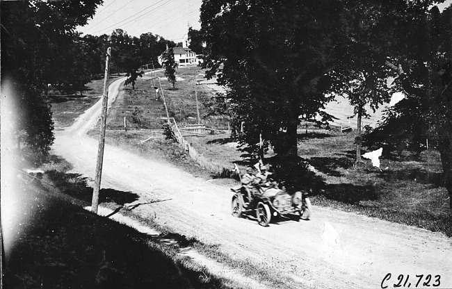 Frank Steinman in Hupmobile car nearing Mankato, Minn., at 1909 Glidden Tour