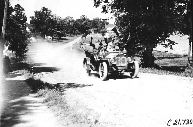 Dan McIntosh in Studebaker car nearing Mankato, Minn., at 1909 Glidden Tour