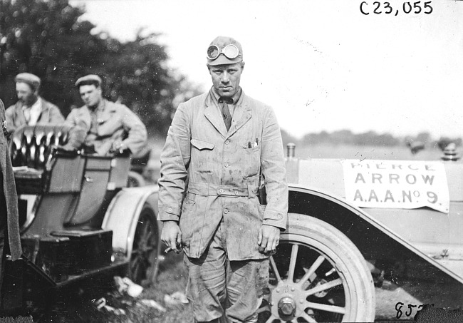 Glidden Tour driver next to Pierce-Arrow car at 1909 Glidden Tour