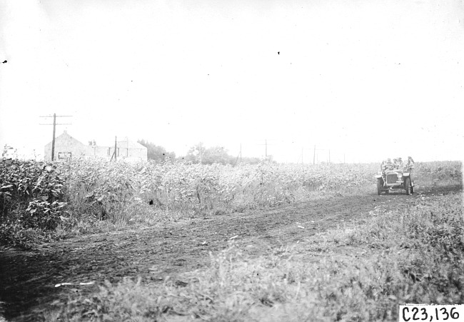 Driving through a field in the 1909 Glidden Tour