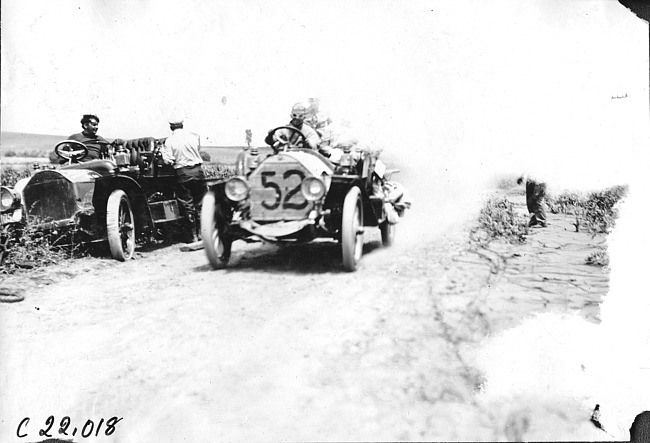 Jean Bemb in Chalmers car on rural road near Arion, Iowa at the 1909 Glidden Tour