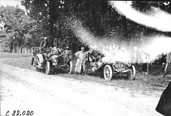 J. Machesky in Chalmers car and Studebaker press car stopped near Woodbine, Iowa at 1909 Glidden Tour