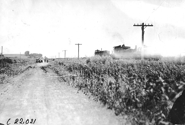 Glidden tourist vehicle stopped on muddy road near Woodbine, Iowa at 1909 Glidden Tour