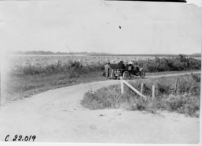 Thomas car in a wheat field near Rogers, Neb., at the 1909 Glidden Tour