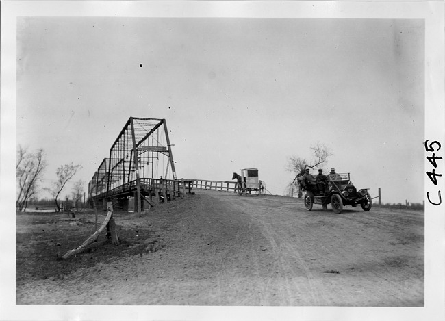 Dai H. Lewis and his party, crossing Loup River bridge, at the 1909 Glidden Tour