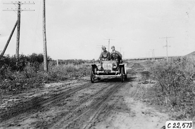 Brush car #104 passing through Chapman, Neb., at the 1909 Glidden Tour