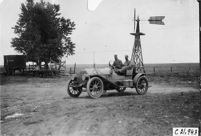 Chalmers car in front of windmill near Kearney, Neb., at 1909 Glidden Tour