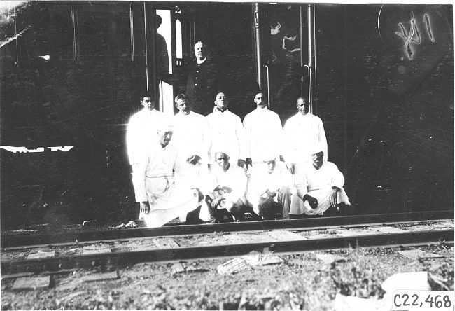 Pullman employees pose in front of railroad car in Kearney, Neb., at 1909 Glidden Tour